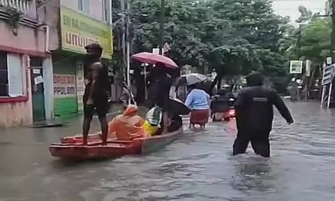 Fire personnel rescues trapped residents in boats amid flooding in Velachery