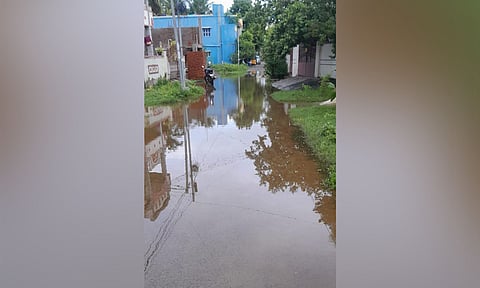 Rainwater mixed with drainage overflowing on 6th Main Road, East Gopalapuram