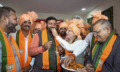 Nayab Singh Saini celebrates with BJP leaders and workers after he was unanimously elected as the party's legislature party leader in Haryana