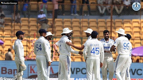 Team celebrating after Bumrah after picking the wicket 
