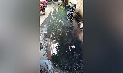 Drainage water overflowing on the Arian Lane in Vepery