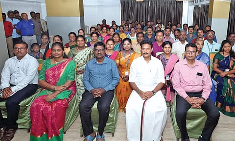 Minister Anbil Mahesh Poyyamozhi with State run school teachers
