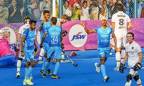  India's Sukhjeet Singh with teammates celebrates after India scored a goal during the second men's hockey match of a two-match series between India and Germany (PTI)