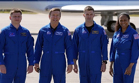 The SpaceX crew of the Dragon spacecraft, from left, cosmonaut Alexander Grebenkin, pilot Michael Barratt, commander Matthew Dominick and mission specialist Jeanette Epps 