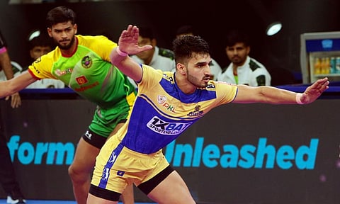 Tamil Thalaivas raider Narender in action