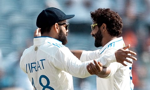 Ravindra Jadeja celebrates with Virat Kohli after taking wicket (PTI)