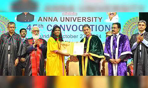 Governor RN Ravi hands over degree certificate to an Anna University student