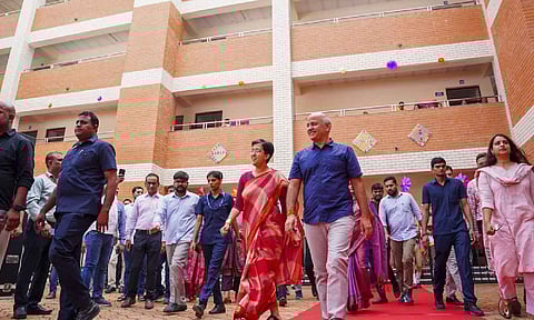 Delhi Chief Minister Atishi with former deputy CM Manish Sisodia during the inauguration of a newly built building of a school in Mandawali area, in New Delhi (Credit: PTI)