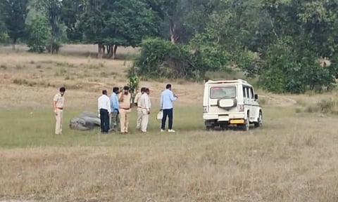 Police personnel and other officials at the Bandhavgarh Tiger Reserve after the death of seven elephants, in Umaria district (PTI) 