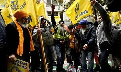 Protesters outside the consulate general of India (Reuters)