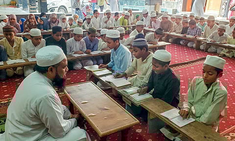 Visual of Children learning at a Madrasa in Agra