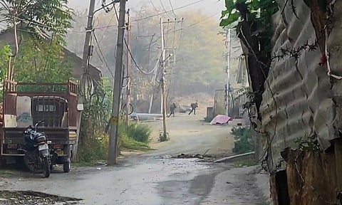 Security forces jawans take positions during an encounter with terrorists in Nishat Bagh area of Srinagar (PTI)