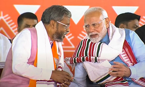 Prime Minister Narendra Modi with Jharkhand BJP President Babulal Marandi during a public meeting ahead of Jharkhand Assembly elections (PTI)