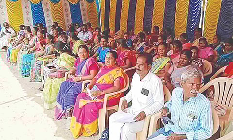 Noon meal workers at a sit-in protest in city on Tuesday