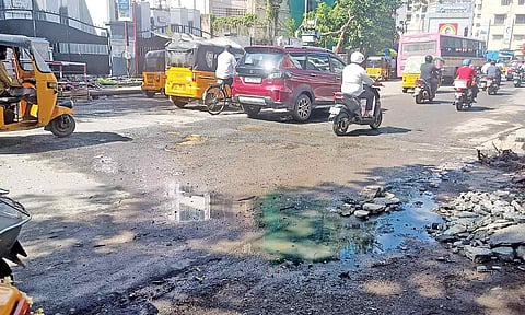 Sewage overflowing on the damaged Millers Road in Purasawalkam 