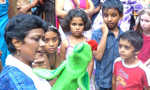Dr R Bhanumathi using her puppet to educate kids