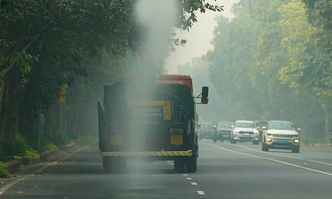 Anti-smog guns being used to spray water droplets to curb air pollution, in New Delhi (PTI) 