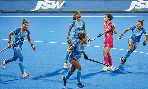 India's Lalremsiami (centre) celebrates after scoring a goal against Japan