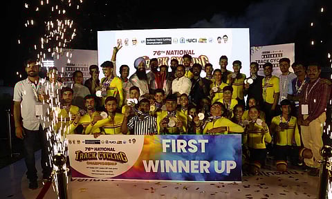 Rajasthan team atop the podium with the title