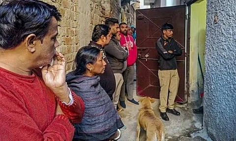 Police personnel and public at Neb Sarai area (PTI) 