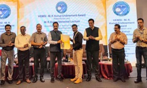 ISRO scientist Pramod R Nair receivng award from ISRO Chairman Dr. S. Somanath given in the presence of the Director General of DRDO and the directors of VSSC, LPSC, and IISU. (UNI)