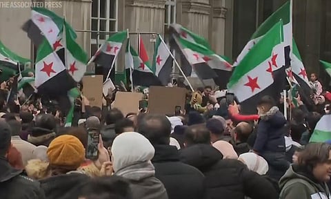 Syrians took to the streets in cities across the world to celebrate the fall of President Bashar Assad on Sunday