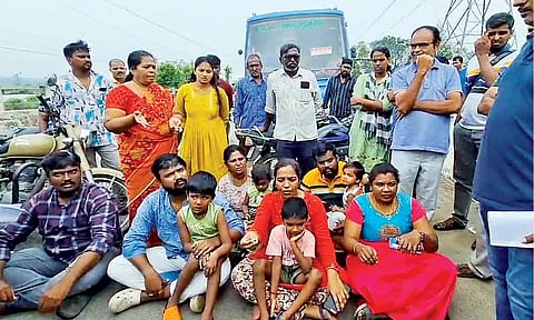 Residents block the Ottiyambakkam main road to protest official delay in pumping water from their locality