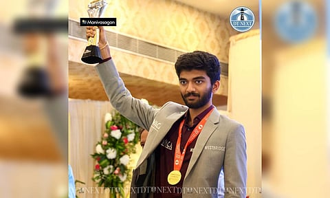 Gukesh D pose with the trophy on his felicitation event (Manivasagan)