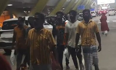 Fisherman arrive at the Chennai Airport 