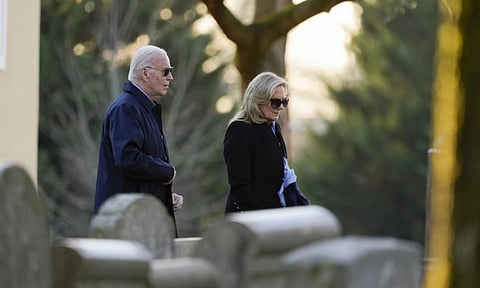 President Joe Biden and his first lady Jill Biden arrive at St. Joseph on the Brandywine Catholic Churuch in Wilmington, Del., on Wednesday (AP Photo)