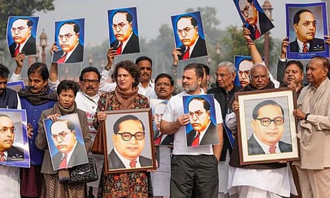 Leader of Opposition in Lok Sabha Rahul Gandhi, Leader of Opposition in Rajya Sabha Mallikarjun Kharge and others during their protest in New Delhi on Wednesday. (PTI)