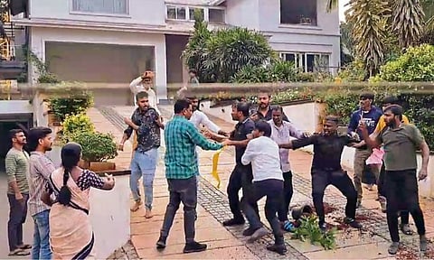 Protesters at the residence of Telugu actor Allu Arjun in Hyderabad on Sunday (PTI)