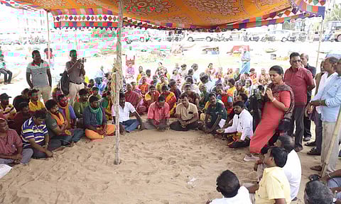 Fisherfolk gathered under a tent on Tuesday (Photo: P. Ashish) 