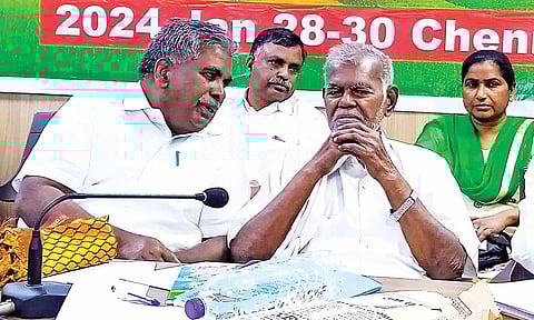 R Nallakannu (R) during a CPI meeting early this year (file photo) 