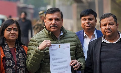 AAP leader Sanjay Singh outside the ED office where he arrived to file a complaint against BJP leaders Parvesh Verma and Manjinder Singh Sirsa for allegedly distributing cash to voters in the New Delhi constituency from where AAP national convener Arvind Kejriwal is the sitting MLA, in New Delhi (PTI) 