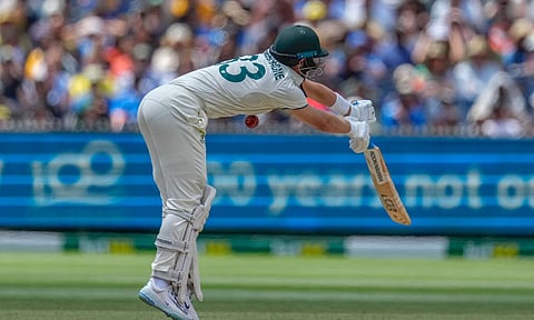 Marnus Labuschagne is hit by a ball from India's Jasprit Bumrah during play on the day four of the fourth cricket test (PTI)