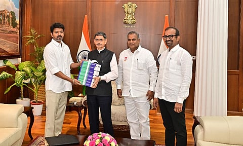 Governor RN Ravi presented "Compilation of Bharathiar Kavithaigal " to Tamilaga Vettri Kazhagam Party President Vijay at the Raj Bhavan 