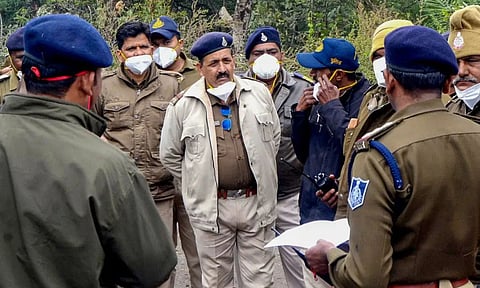 Police personnel deployed during the collection of toxic waste for disposal from the Bhopal Union Carbide factory (PTI)