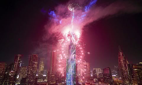 Fireworks explode at the Burj Khalifa, the world's tallest building, during the New Year's Eve celebration in Dubai, UAE (AP Photo)