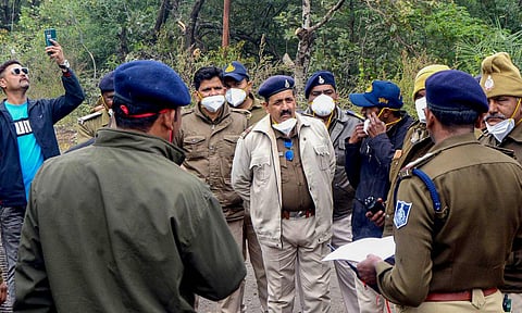 Police personnel deployed during the collection of toxic waste for disposal from the Bhopal's Union Carbide factory