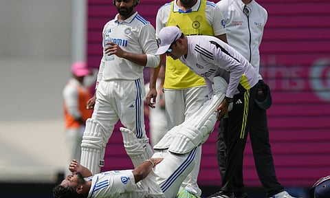 India's Rishabh Pant receives treatment after he was hit while batting during play on the first day of the fifth Test (AP) 