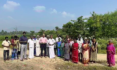 Agri chamber chief Rethinavelu with some of the Nayakkarpatti villagers near Melur