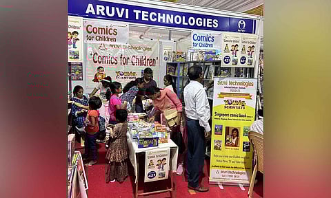Comic book stalls are crowded with children and parents
