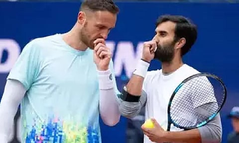 India's Yuki Bhambri and his French partner Albano Olivetti (X) 