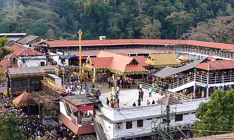 Devotees gather for 'Makara Jyothi darshan' at the Sabarimala temple (PTI)