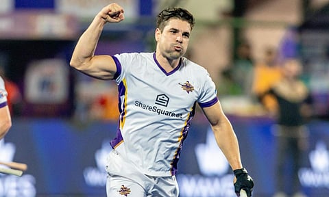 Gonzalo Peillat celebrates after scoring from a penalty corner