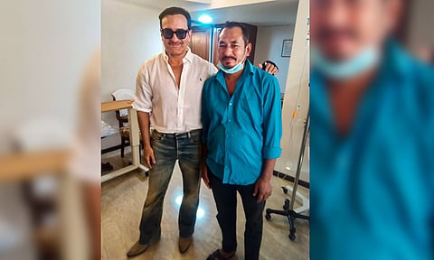 Bollywood actor Saif Ali Khan is seen with auto-rickshaw driver Bhajan Singh Rana, who rushed him to hospital after he was injured in the knife attack at his home, at the Lilavati Hospital before getting discharged, in Mumbai (PTI) 