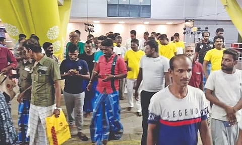 Fishermen arriving at Chennai airport on Wednesday