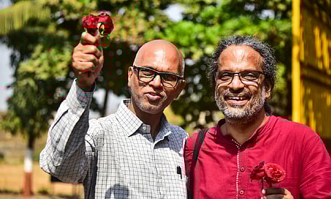 Researcher Rona Wilson, right, and activist Sudhir Dhawale, left, accused in the Elgar Parishad-Maoist links case, after being released on bail from a Navi Mumbai prison, more than six years after they were arrested, Friday, Jan. 24, 2025 (PTI) 