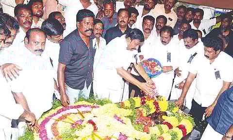 DMK workers led by Minister KN Nehru paying floral tributes at Tamil Language Martyrs memorial in Tiruchy on Saturday